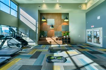 Two-level fitness center w/ state-of-the-art equipment